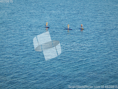 Image of Riding on inflatable boards.