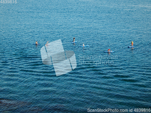 Image of Riding on inflatable boards.