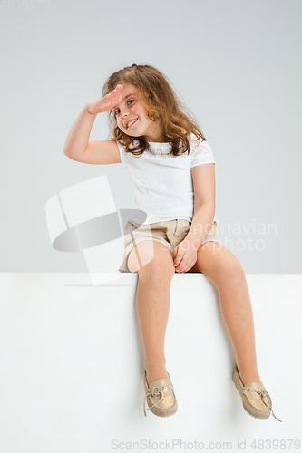 Image of Pretty caucasian girl portrait isolated on white studio background with copyspace