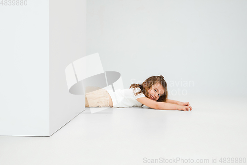 Image of Pretty caucasian girl portrait isolated on white studio background with copyspace