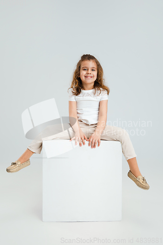 Image of Pretty caucasian girl portrait isolated on white studio background with copyspace