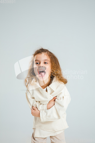 Image of Pretty caucasian girl portrait isolated on white studio background with copyspace