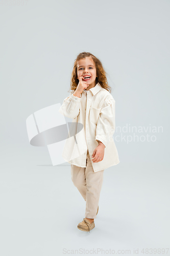 Image of Pretty caucasian girl portrait isolated on white studio background with copyspace
