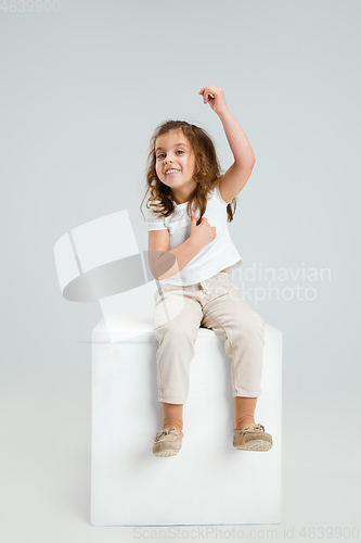 Image of Pretty caucasian girl portrait isolated on white studio background with copyspace