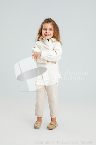 Image of Pretty caucasian girl portrait isolated on white studio background with copyspace