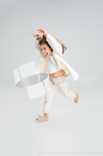Image of Pretty caucasian girl portrait isolated on white studio background with copyspace