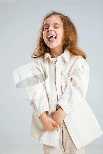 Image of Pretty caucasian girl portrait isolated on white studio background with copyspace