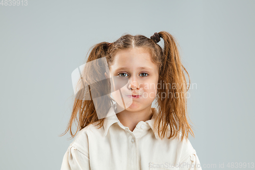 Image of Pretty caucasian girl portrait isolated on white studio background with copyspace