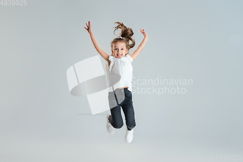 Image of Pretty caucasian girl portrait isolated on white studio background with copyspace