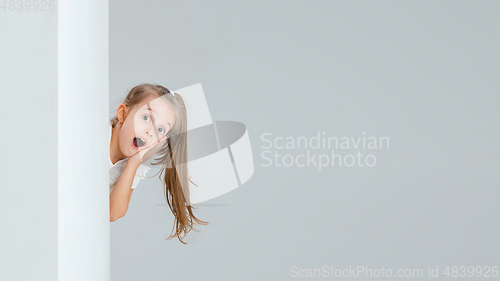 Image of Pretty caucasian girl portrait isolated on white studio background with copyspace