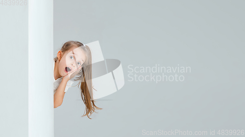 Image of Pretty caucasian girl portrait isolated on white studio background with copyspace