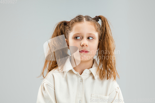 Image of Pretty caucasian girl portrait isolated on white studio background with copyspace