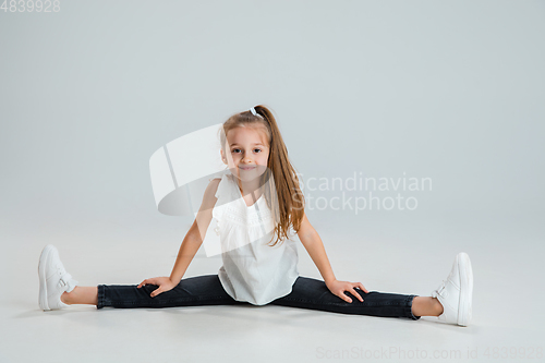 Image of Pretty caucasian girl portrait isolated on white studio background with copyspace