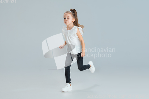 Image of Pretty caucasian girl portrait isolated on white studio background with copyspace