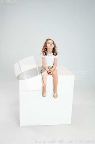 Image of Pretty caucasian girl portrait isolated on white studio background with copyspace