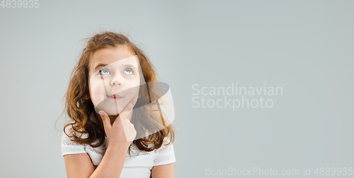 Image of Pretty caucasian girl portrait isolated on white studio background with copyspace