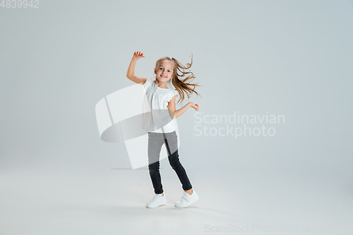 Image of Pretty caucasian girl portrait isolated on white studio background with copyspace