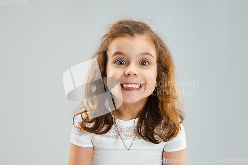 Image of Pretty caucasian girl portrait isolated on white studio background with copyspace