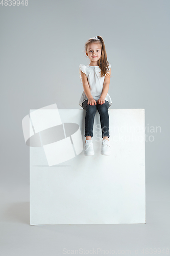 Image of Pretty caucasian girl portrait isolated on white studio background with copyspace