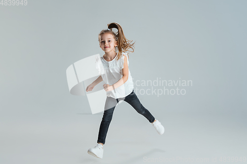 Image of Pretty caucasian girl portrait isolated on white studio background with copyspace