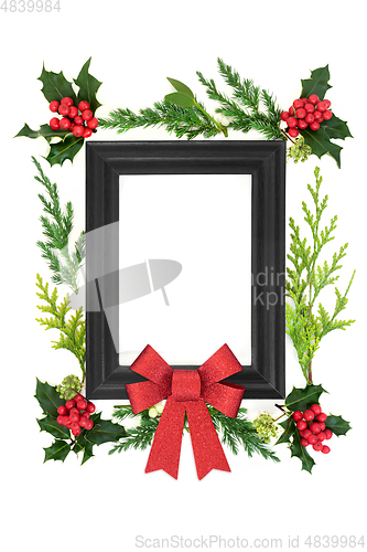 Image of Christmas Abstract Background with Frame Bow and Flora