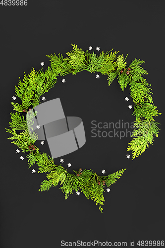 Image of Snowflake and Cedar Leaf Wreath Abstract