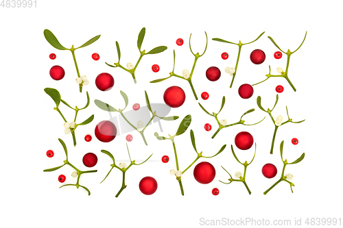 Image of Christmas Festive Scene with Baubles Berries and Mistletoe