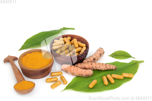 Image of Turmeric Root Health Food with Powder and Capsules