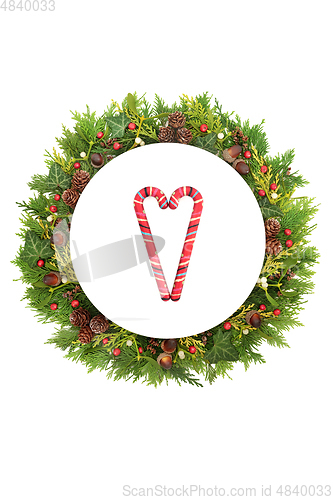 Image of Christmas Abstract Place Setting with Candy Canes and Greenery