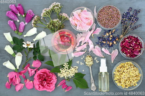 Image of Essential Oil Preparation with Herbs and Flowers