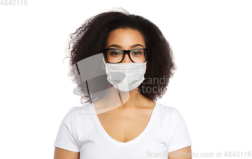 Image of african american woman in protective medical mask