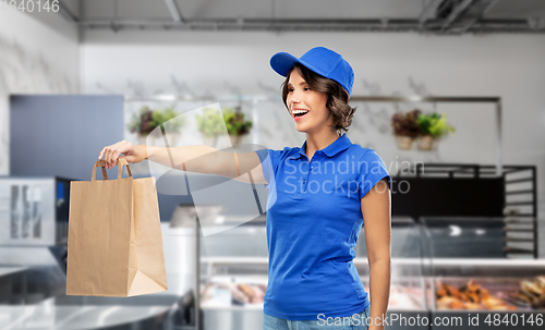 Image of delivery woman with takeaway food in paper bag