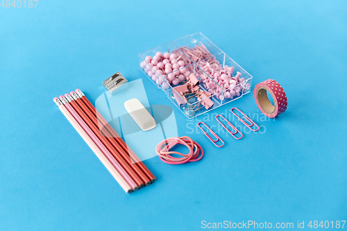 Image of pencils, pins, clips, eraser, sharpener and rubber