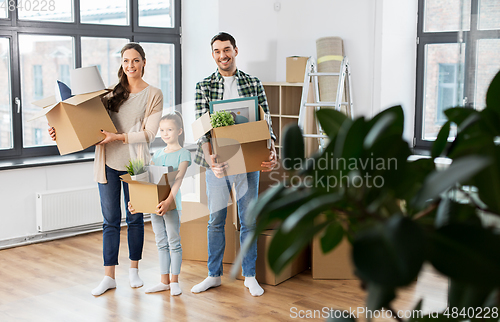 Image of happy family with child moving to new home