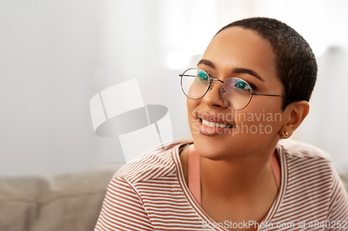 Image of portrait of african american woman in glasses