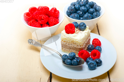 Image of fresh raspberry and blueberry cake