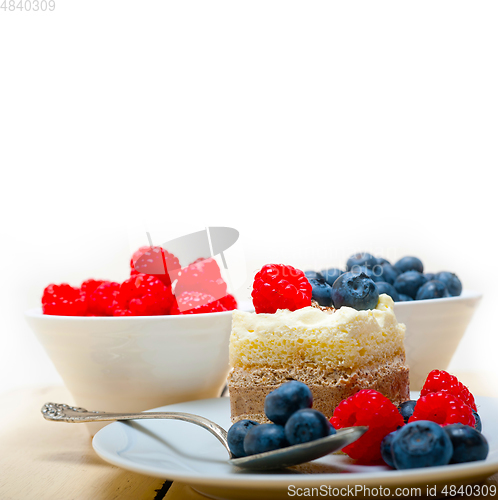 Image of fresh raspberry and blueberry cake