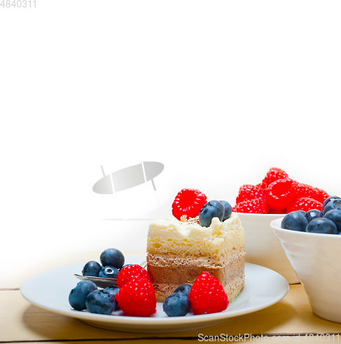 Image of fresh raspberry and blueberry cake