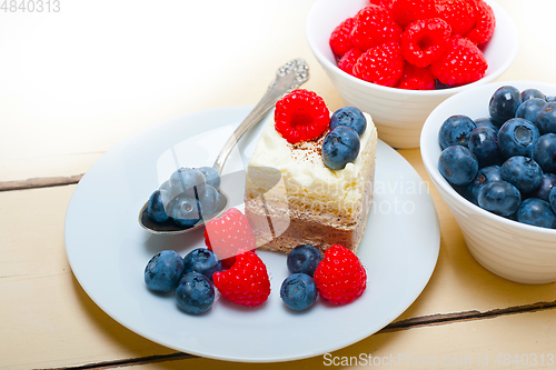 Image of fresh raspberry and blueberry cake