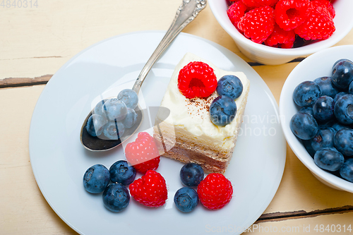 Image of fresh raspberry and blueberry cake