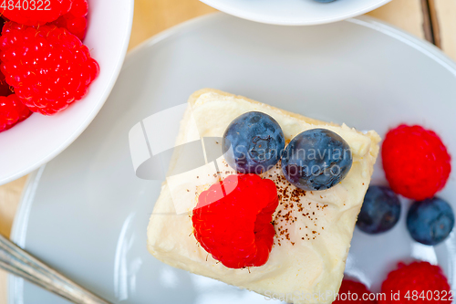 Image of fresh raspberry and blueberry cake