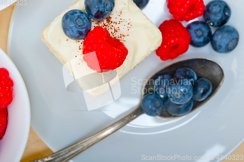 Image of fresh raspberry and blueberry cake