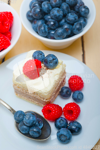 Image of fresh raspberry and blueberry cake