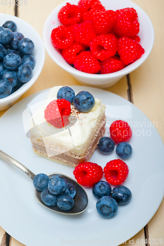 Image of fresh raspberry and blueberry cake