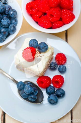 Image of fresh raspberry and blueberry cake