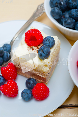 Image of fresh raspberry and blueberry cake