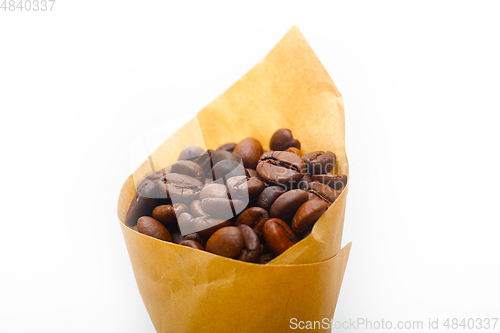 Image of espresso coffee beans on a paper cone