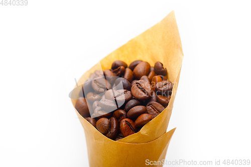 Image of espresso coffee beans on a paper cone