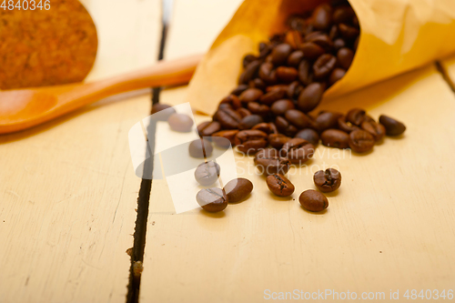 Image of espresso coffee beans on a paper cone