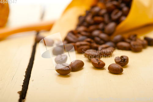 Image of espresso coffee beans on a paper cone